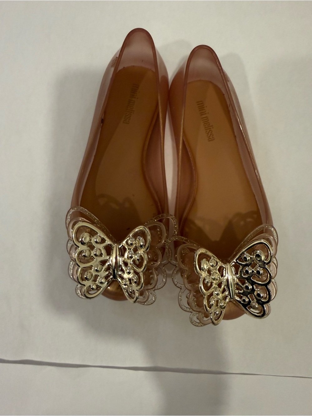 Mini Melissa Rose-Tinted Jelly Flats with Gold Butterfly Accent